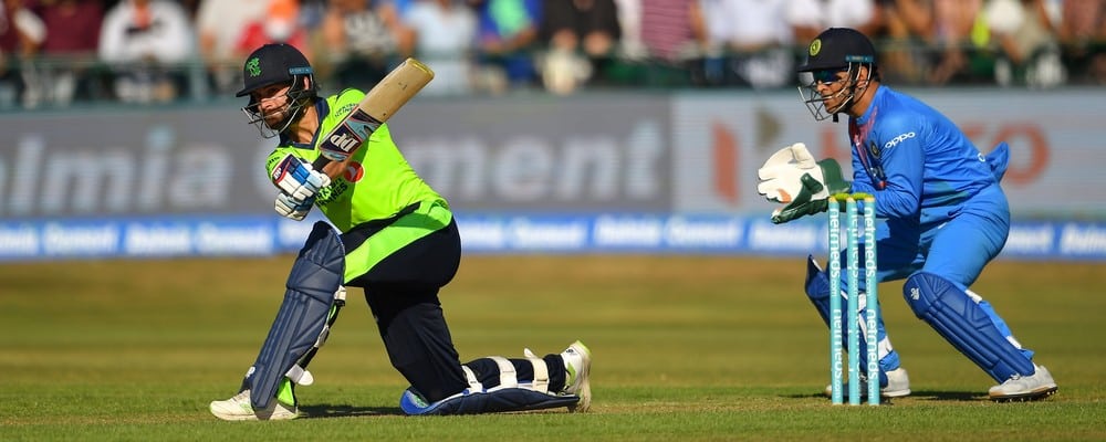 27 June 2018; James Shannon of Ireland and MS Dhoni of India in action during the T20 International match between Ireland and India at Malahide Cricket Club Ground in Dublin. Photo by Seb Daly/Sportsfile