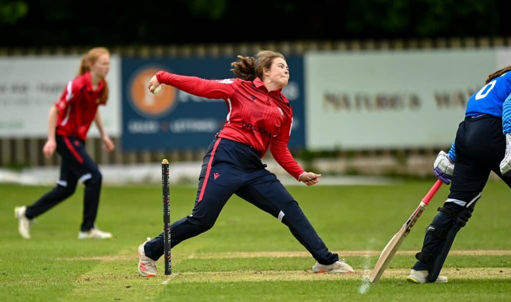 Cara Murray delivers during her POTM performance against Typhoons (Sportsfile).