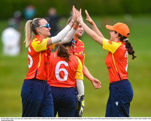 01 May 2023; Gaby Lewis, left, and Annabel Squires of Scorchers celebrate after Jamie-Lee Strang of Dragons was run out during the Evoke T20 Super Series 2023 match between Scorchers and Dragons at Malahide Cricket Club in Dublin. Photo by David Fitzgerald/Sportsfile