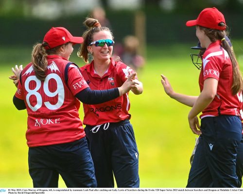 01 May 2023; Cara Murray of Dragons, left, is congratulated by teammate Leah Paul after catching out Gaby Lewis of Scorchers during the Evoke T20 Super Series 2023 match between Scorchers and Dragons at Malahide Cricket Club in Dublin. Photo by David Fitzgerald/Sportsfile