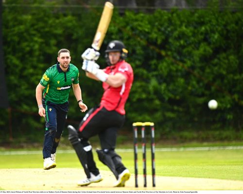 15 May 2023; Jared Wilson of North West Warriors delivers to Mathew Ford of Munster Reds during the Cricket Ireland Inter-Provincial Series match between Munster Reds and North West Warriors at The Mardyke in Cork. Photo by Eóin Noonan/Sportsfile