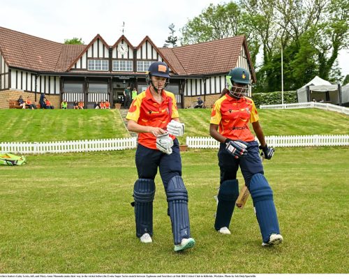 21 May 2023; Scorchers batters Gaby Lewis, left, and Mary-Anne Musonda make their way to the wicket before the Evoke Super Series match between Typhoons and Scorchers at Oak Hill Cricket Club in Kilbride, Wicklow. Photo by Seb Daly/Sportsfile
