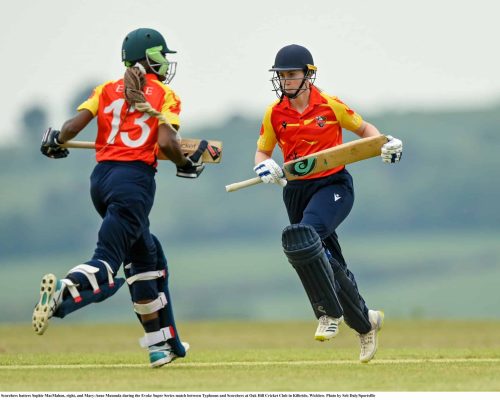 21 May 2023; Scorchers batters Sophie MacMahon, right, and Mary-Anne Musonda during the Evoke Super Series match between Typhoons and Scorchers at Oak Hill Cricket Club in Kilbride, Wicklow. Photo by Seb Daly/Sportsfile