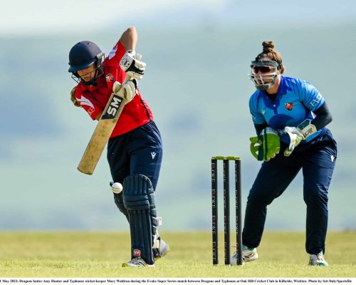 21 May 2023; Dragons batter Amy Hunter and Typhoons wicket-keeper Mary Waldron during the Evoke Super Series match between Dragons and Typhoons at Oak Hill Cricket Club in Kilbride, Wicklow. Photo by Seb Daly/Sportsfile